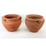 A RARE PAIR OF COMPTON POTTERY TERRACOTTA 'SCROLL' URNS, early 20th century, of traditional form