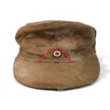 A 1942 GERMAN AFRIKA KORPS M43 DESERT FIELD CAP (Tropeneinheitsfeldmutze) made by Opoila and Muller,