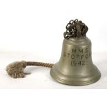 A 1942 METAL SHIP'S BELL FROM H.M.S. STOPFORD, annotated on bell exterior, with a knotted striker
