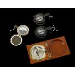 TWO T.G. CO LTD MARK III SIGHTING / MARCHING COMPASSES (1940 and 1945), one in a webbing ponch,