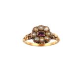An amethyst and pearl ring, circa 1850 The cushion-shaped amethyst, in a foiled closed-back setting,