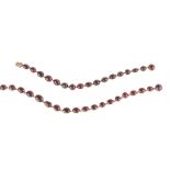 A 19th century garnet necklace, bracelet and earrings The early 19th century garnet rivière, set