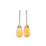 A pair of citrine and diamond pendent earrings The line of brilliant-cut diamonds, terminating in