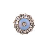 An early 19th century paste brooch The circular blue iridescence paste, within a surround of