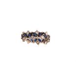 A sapphire and diamond eternity ring Set throughout with marquise-cut sapphires and brilliant-cut