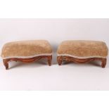 A pair of antique French fruitwood stools of petite size, having carved scroll border, later