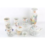 A collection of Chinese famille rose porcelain, comprising brush pots, vases and a teapot, 20th