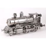 A contemporary scratch built steel locomotive, constructed from recycled engine machine parts,