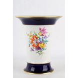 A Meissen porcelain vase, 20th Century, of flared cylindrical form, painted with a spray of