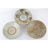 Three early Chinese provincial dishes with blue decoration, average diameter 25cm.