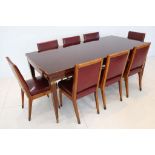 A 1940s ITALIAN WALNUT DINING TABLE, DESIGNED BY OSVALDO BORSANI, with dark red glass inlaid top,