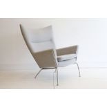 A CH447 WING CHAIR, DESIGNED BY HANS WEGNER, MANUFACTURED BY CARL HANSEN & SON, DENMARK, in grey