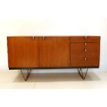 JOHN & SYLVIA REID 1960s TEAK SIDEBOARD, with double cupboard, and four drawers, on steel rod