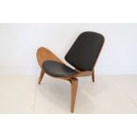 A CH07 SHELL CHAIR, DESIGNED BY HANS WEGNER, MANUFACTURED BY CARL HANSEN & SON, DENMARK, with