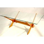 A 1960s COFFEE TABLE, designed by Illum Wikkelso, and manufactured by Soren Willadsen, with