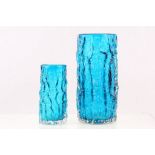 A PAIR OF 1960S WHITEFRIARS KINGFISHER BLUE GLASS BARK VASES, (23 cm and 15.5 cm high)