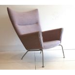 A CH447 WING CHAIR, DESIGNED BY HANS WEGNER, MANUFACTURED BY CARL HANSEN & SON, DENMARK, in lilac