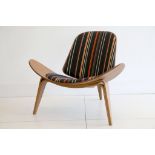 A CH07 SHELL CHAIR, DESIGNED BY HANS WEGNER, MANUFACTURED BY CARL HANSEN & SON, DENMARK, with Paul