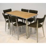 A 1950s ERNEST RACE B.A. DINING TABLE AND SIX CHAIRS, with walnut top and cast aluminium bases (