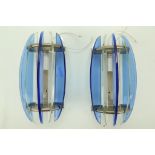 A PAIR OF 1960s ITALIAN MURANO GLASS WALL LIGHTS, manufactured by Veca, with clear and dark blue