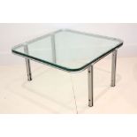 A 1960s SQUARE COFFEE TABLE, designed by Horst Brunig, with glass top, on flat steel base, (76 x