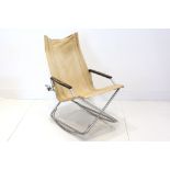 AN EARLY 20th CENTURY BAUHAUS STYLE FOLDING CANVAS CHAIR, with nickel tubular frame and ebonised