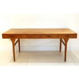 A 1960s DANISH TEAK DESK, DESIGNED BY NANA DITZEL, manufactured by Søren Willadsen, Denmark, with