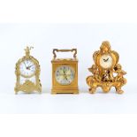 A LATE 19TH CENTURY FRENCH BRASS AND PORCELAIN MANTEL CLOCK TOGETHER WITH TWO OTHERS decorated