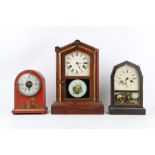 AN EARLY 20TH CENTURY RED LACQUERED CHINOISERIE DECORATED BULLE ELECTRIC CLOCK TOGETHER WITH TWO