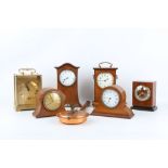 A POLISHED BRASS MANTEL CLOCK TOGETHER WITH SIX OTHER CLOCKS the polished brass clock signed '