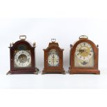 THREE GEORGE III STYLE BRACKET / TABLE CLOCKS comprising a walnut example, the dial with signature