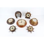 SEVEN VARIOUS BAROMETERS AND CLOCKS OF MARITINE THEME including a horseshoe shaped barometer and