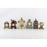 SIX VARIOUS SMALL MANTEL CLOCKS including a 19th century French striking clock in spelter, a