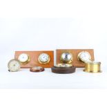 A SELECTION OF BAROMETERS INCLUDING ONE BY NEGRETTI & ZAMBRA comprising two pairs of brass clock and