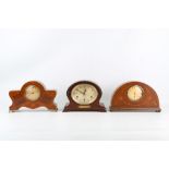 A MAHOGANY QUARTER CHIMING MANTEL CLOCK SIGNED 'LIBERTY LONDON' TOGETHER WITH TWO SIMILAR CLOCKS the