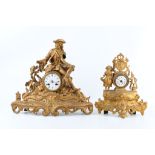 A LATE 19TH CENTURY FRENCH GILT METAL MANTEL CLOCK DEPICTING A HUNTER TOGETHER WITH ANOTHER