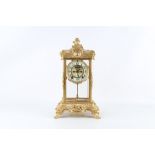 AN EARLY 20TH CENTURY AMERICAN GILT METAL FOUR GLASS MANTEL CLOCK BY THE ANSONIA CLOCK CO. NEW YORK,