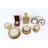 A LATE 19TH CENTURY STEEL AND BRASS DESK COMPENDIUM TOGETHER WITH SIX VARIOUS BRASS CASED CLOCKS the