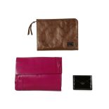 Designer leather goods, to include a hot pink Charles Jourdan clutch bag, a bronzed leather