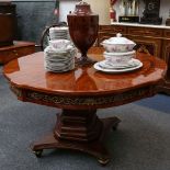 A Louis XVI design, marquetry inlaid kingwood breakfast table, on square pillar and quadruple