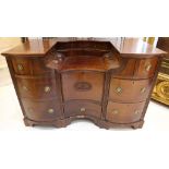 A highly unusual Regency/William IV mahogany serpentine fronted estate desk, possibly Irish Circa