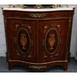 A Louis XV design, marquetry inlaid gilt metal mounted, serpentine side cabinet, with variegated