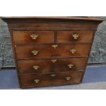 A George III oak chest, formerly a tallboy top section, fitted five drawers, 127cm wide.