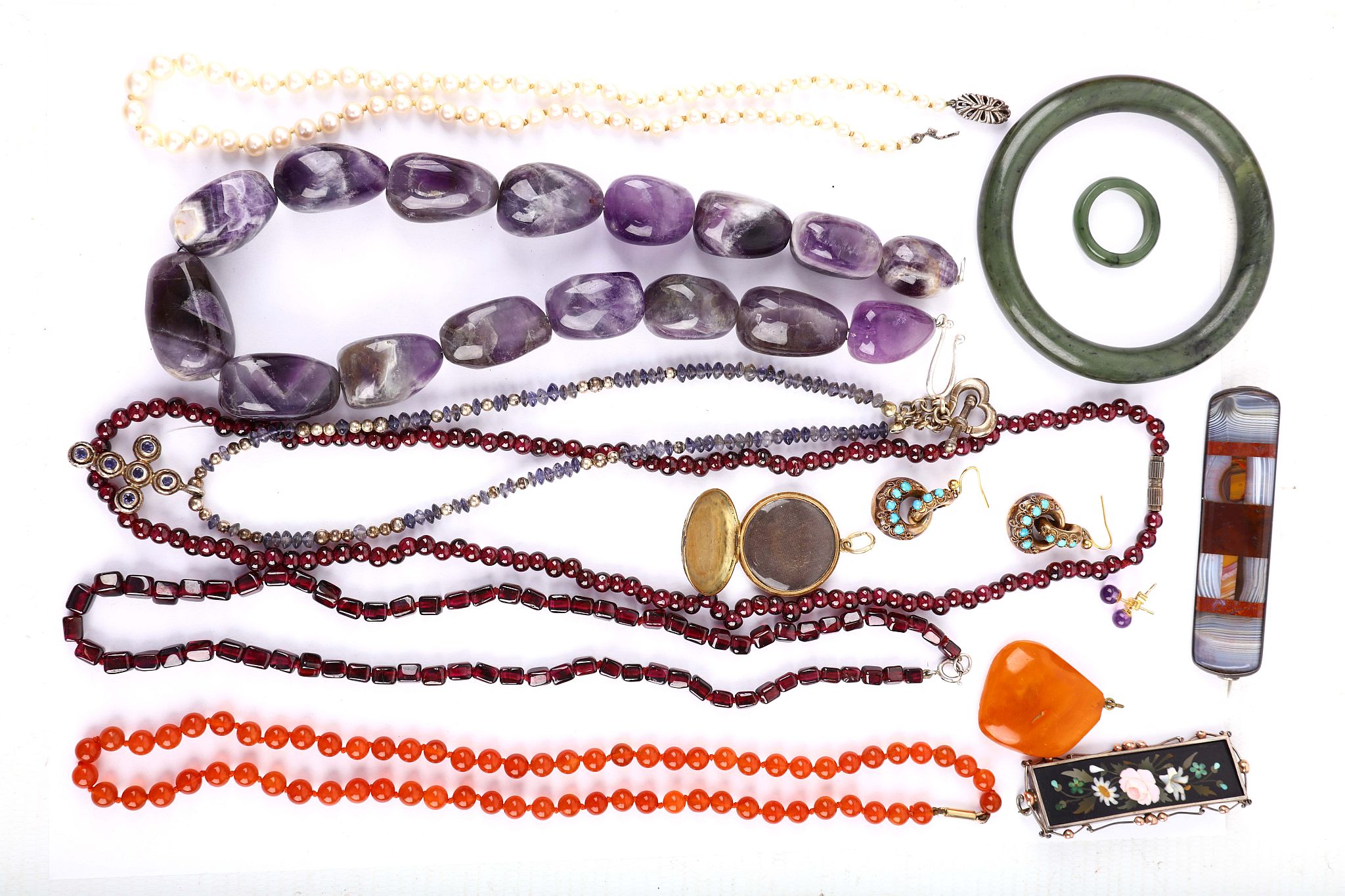 A collection of jewellery, Including a pietra dura brooch, a hardstone brooch, a cultured pearl