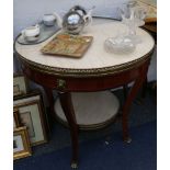 A pair of Louis XVI design, circular gilt metal mounted, centre tables with galleried marble top,