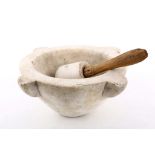 A large antique marble pestle and mortar (2).