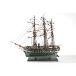 A model of a 3 masted man-o-war with steam funnel and rudder, 90cm long.