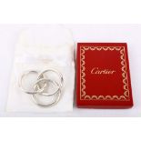 Cartier - three unmarked silver teething rings, boxed.   Weight - 32 grams