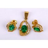 A 22 carat gold, synthetic emerald and imitation diamond pendant and earring suite, UK hallmarks,