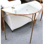 A mid 20th Century gilt metal faux bamboo console table with glass top.